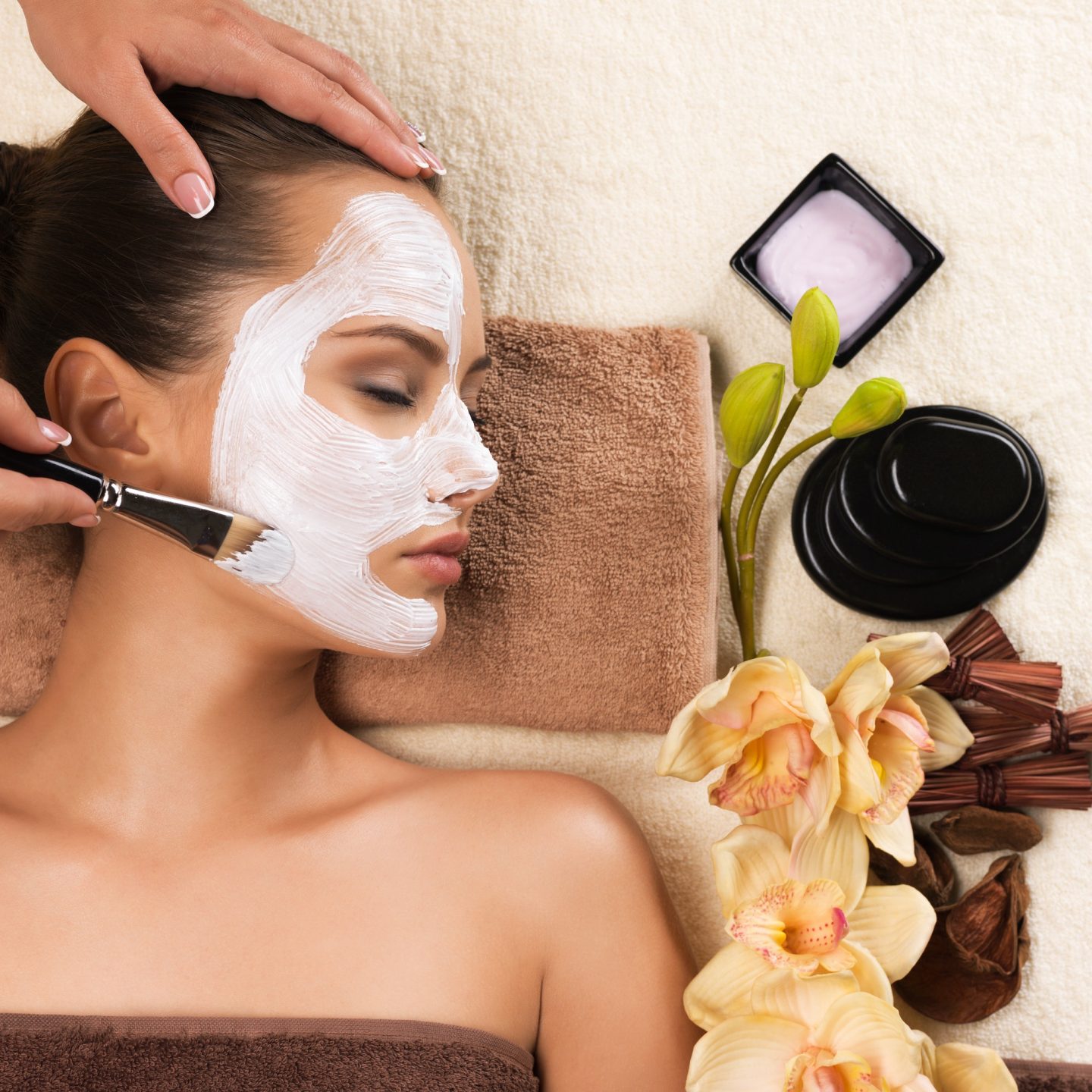 woman-having-a-facial-cosmetic-mask-at-spa-salon--e1672052311383.jpg