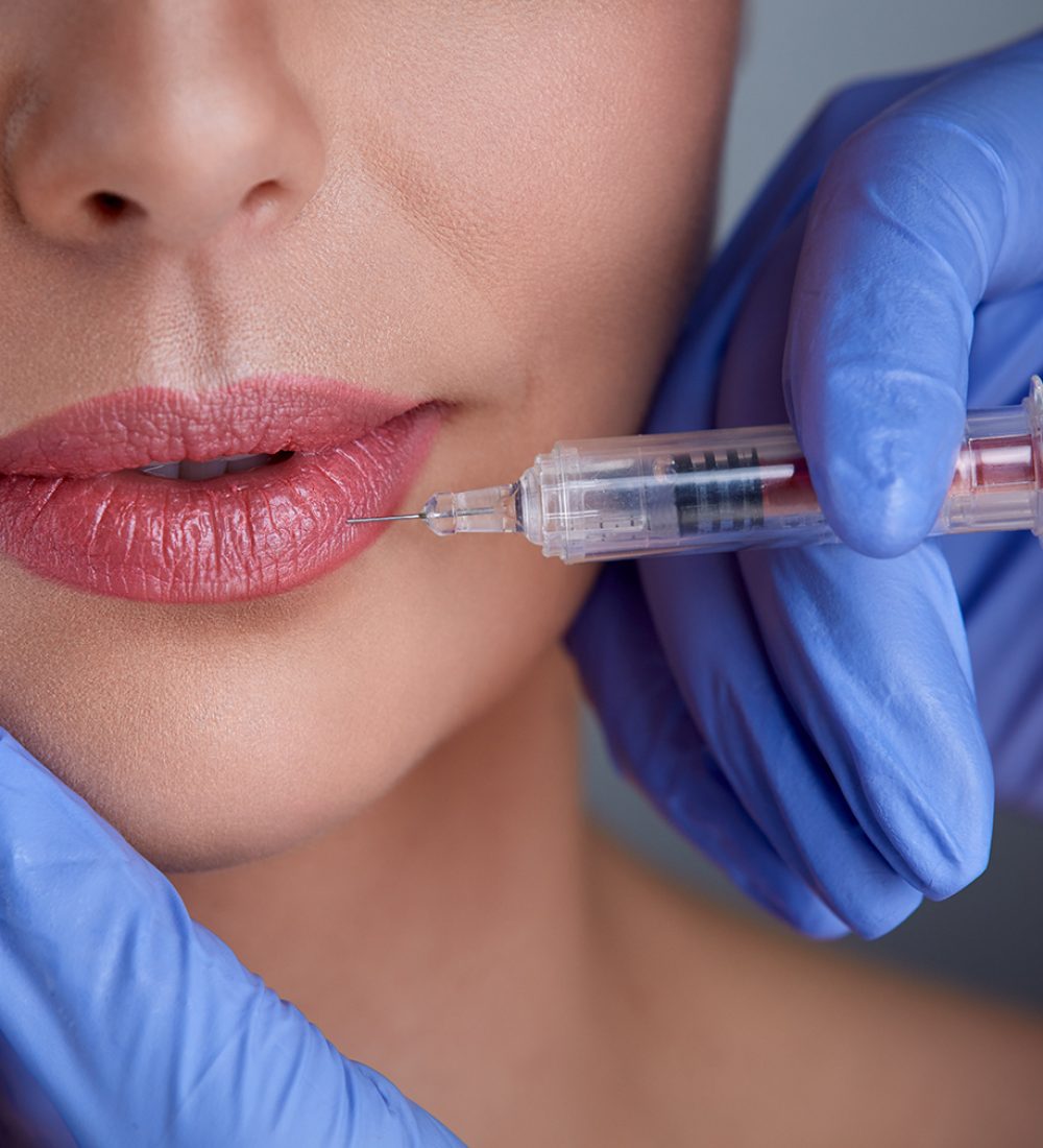 hands-of-expert-injecting-botox-PZX72PN.jpg hands-of-expert-injecting-botox-PZX72PN.jpg